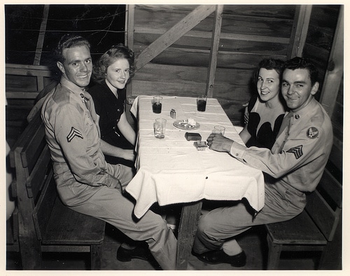 A group of people enjoying a dinner date.